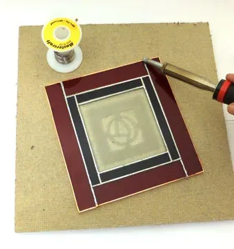 403140-Base-de-Trabajo-Homasote-12x12-10.webpSuperficie de Trabajo para Vitral, Corte y Soldadura (Homasote) - 12" x 12"